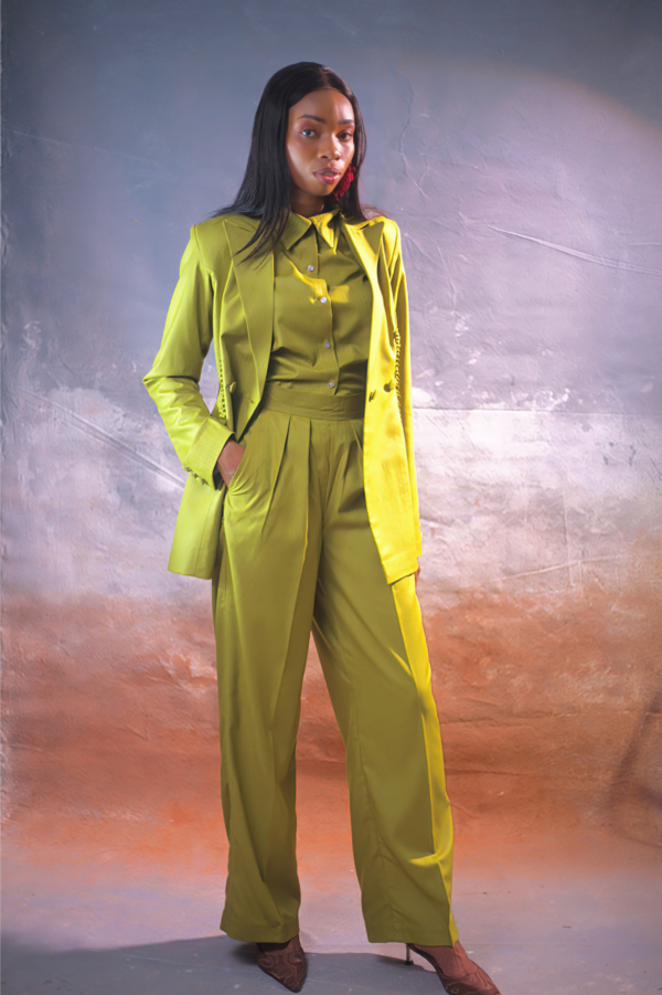 Luxury olive green tailored women’s suit with structured blazer and high-waist wide-leg pants
