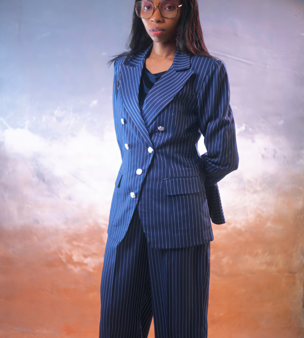 Luxury navy blue pinstripe women’s double-breasted suit with wide-leg tailored trousers